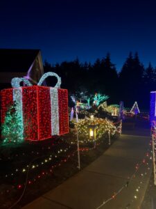 entrance to the lights with large christmas present display